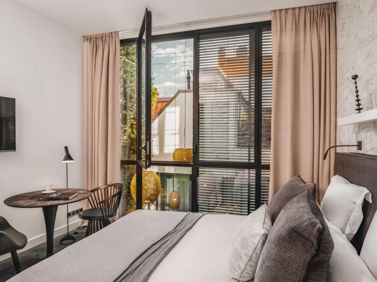 Un ou plusieurs lits dans un hébergement de l'établissement Balthazar Hotel & Spa Rennes - MGallery Collection