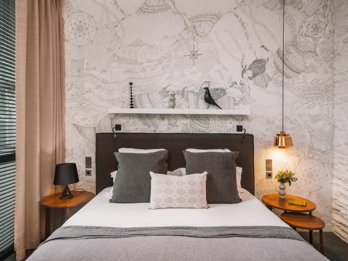 Un ou plusieurs lits dans un hébergement de l'établissement Balthazar Hotel & Spa Rennes - MGallery Collection