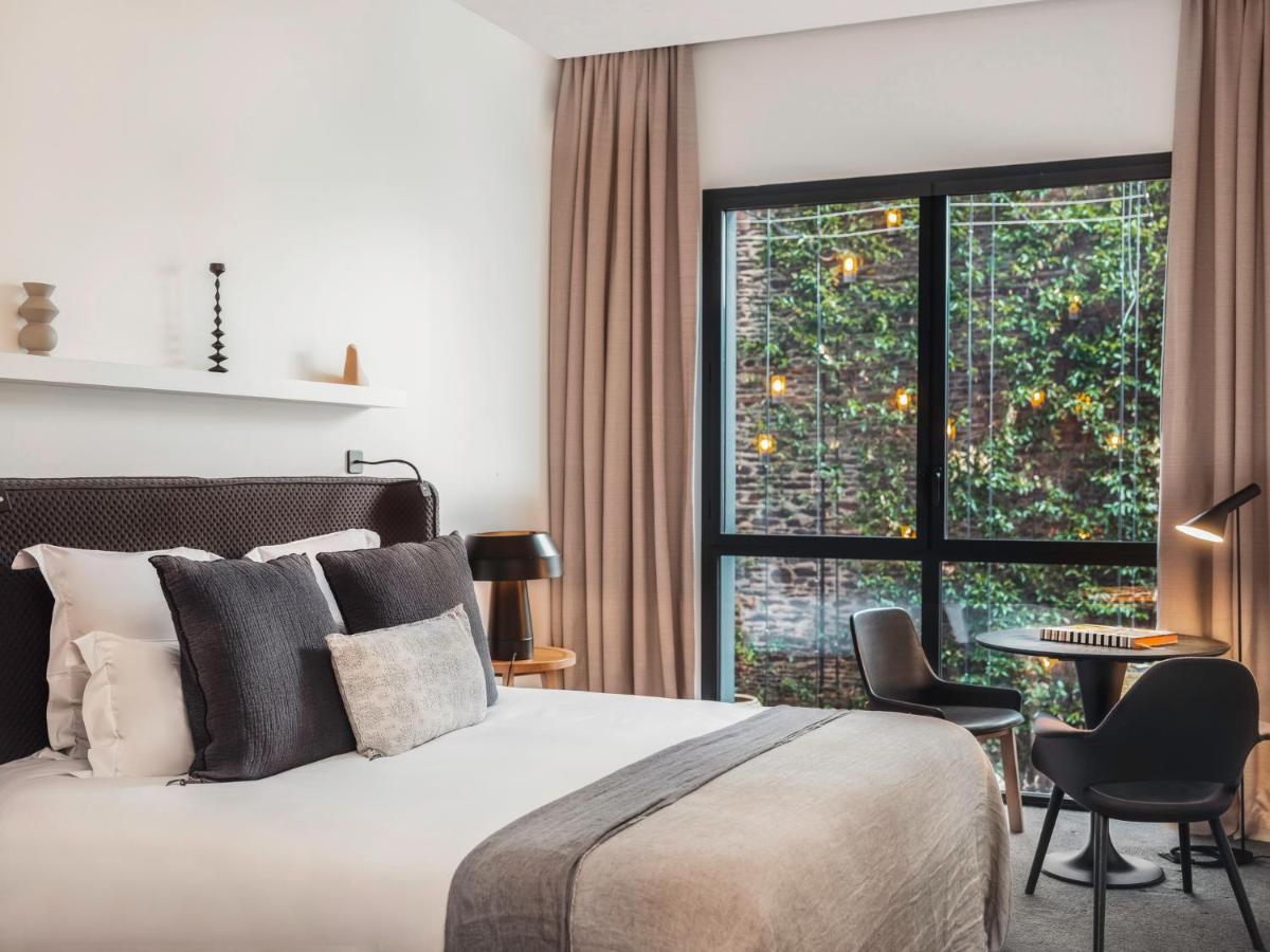 Un ou plusieurs lits dans un hébergement de l'établissement Balthazar Hotel & Spa Rennes - MGallery Collection