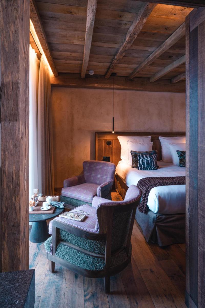 Un ou plusieurs lits dans un hébergement de l'établissement La Ferme Saint Simeon Hotel & Spa - Relais & Chateaux