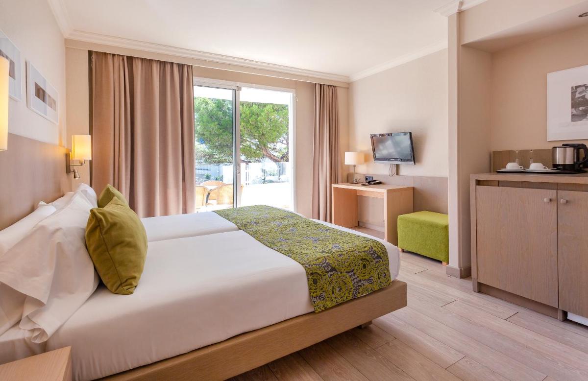 Cama o camas de una habitación en Marins Playa