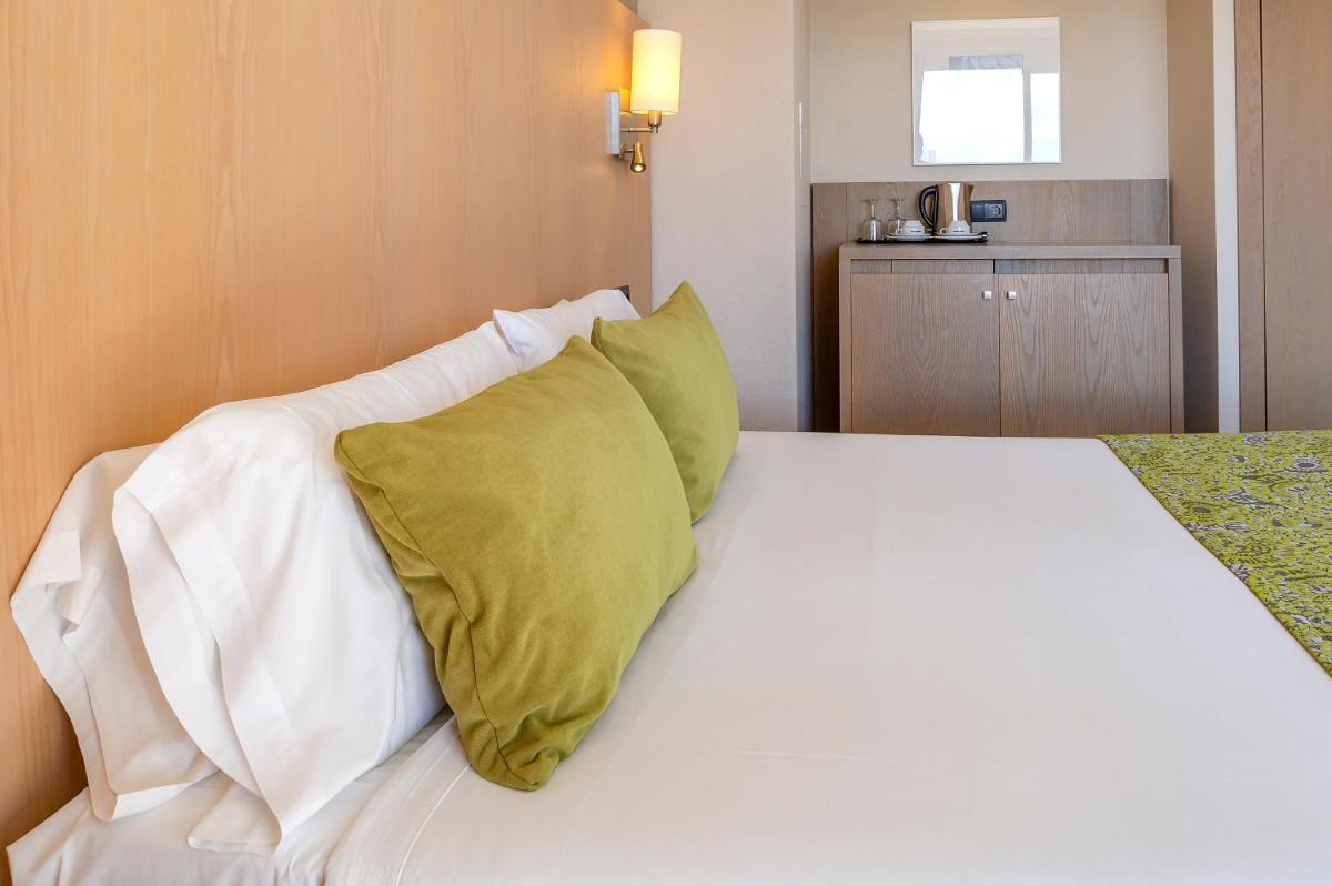 Cama o camas de una habitación en Marins Playa