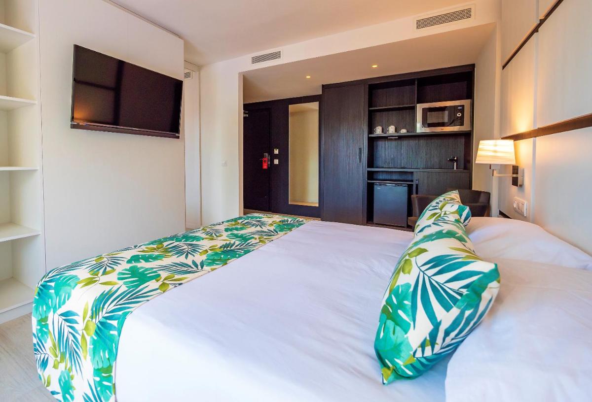 Cama o camas de una habitación en Golden Port Salou & Spa