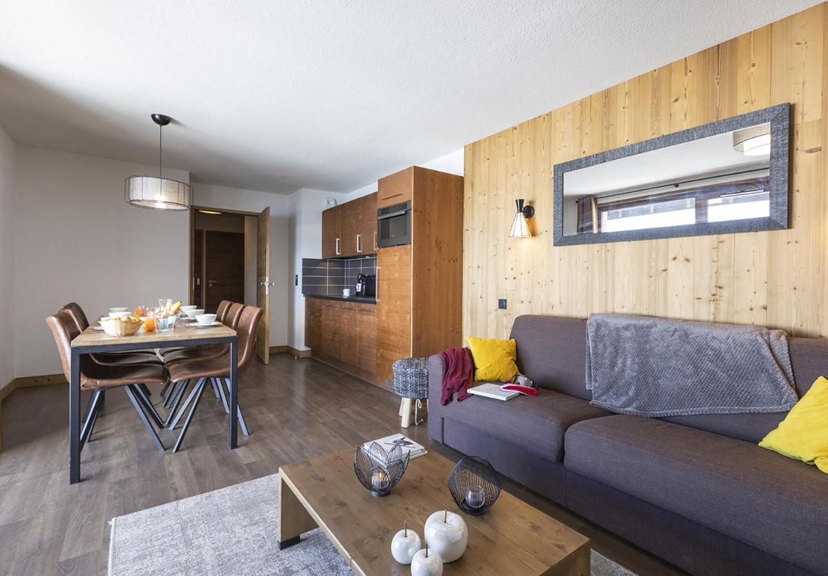 Coin salon dans l'établissement Résidence Club MMV Les Chalets des Cimes