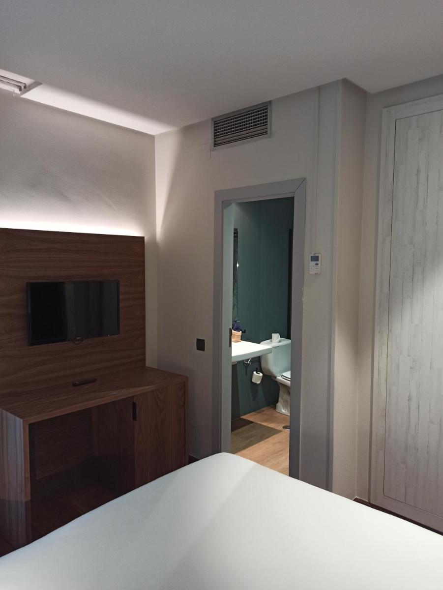 Cama o camas de una habitación en ARVA Spa París