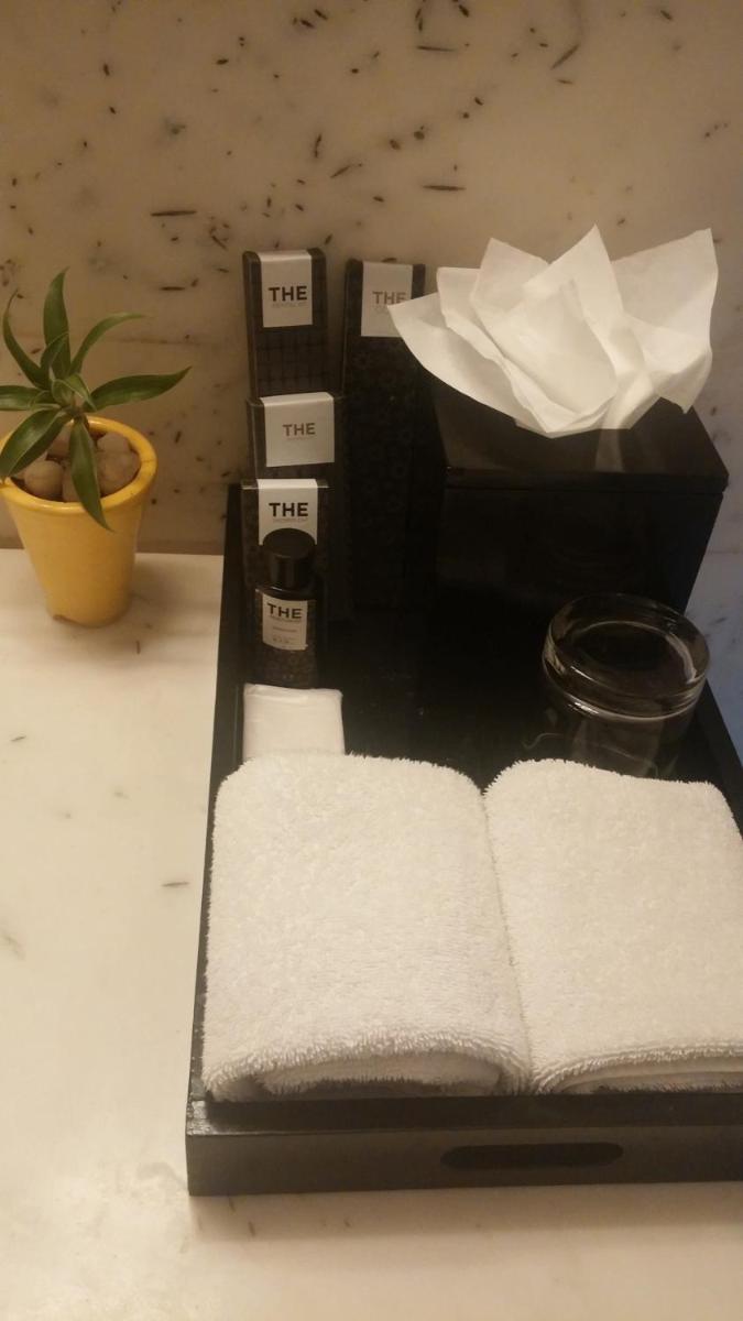 a black tray with an open book on a table at The Park Bangalore, MG Road in Bengaluru a black tray with an open book on a table at The Park Bangalore, MG Road in Bengaluru