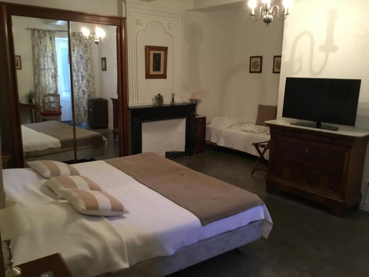 Un ou plusieurs lits dans un hébergement de l'établissement Le Castellas Hotel & SPA - TERITORIA