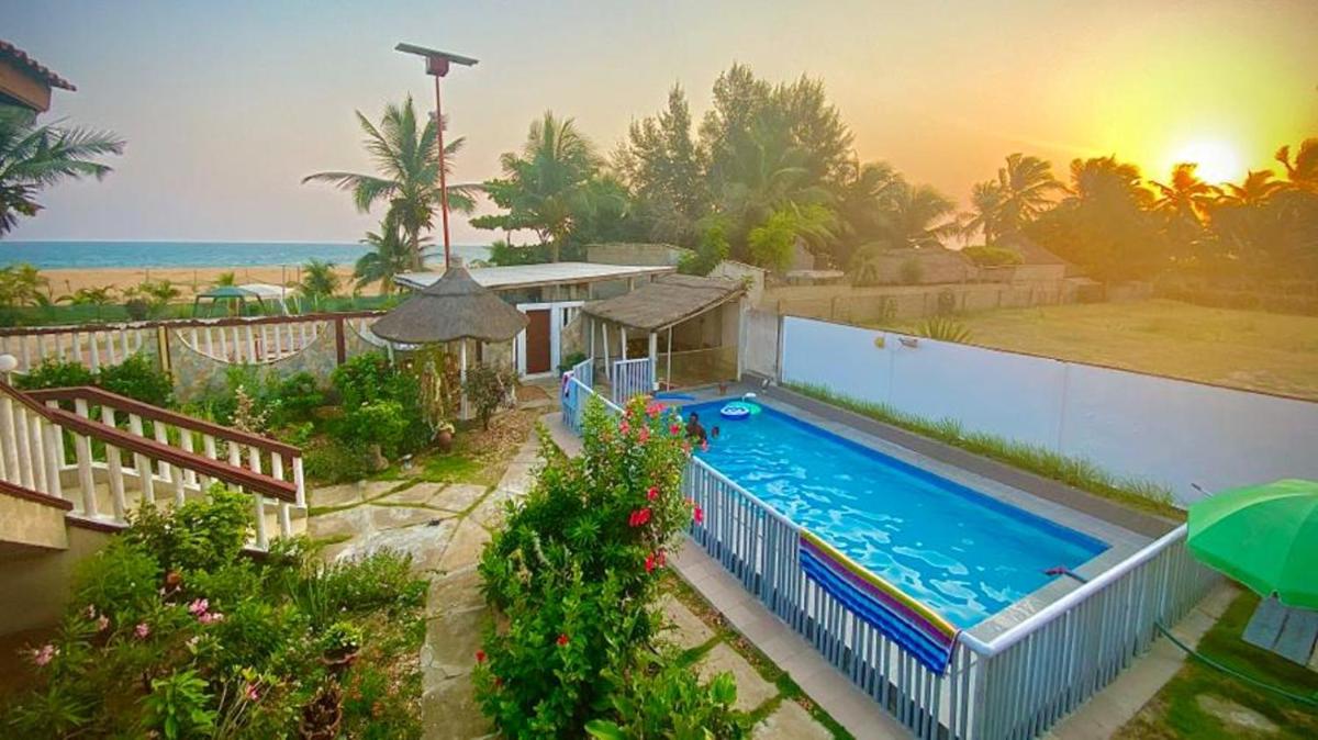 Maison spacieuse à Grand Popo avec piscine partagée 180 m² - Housity