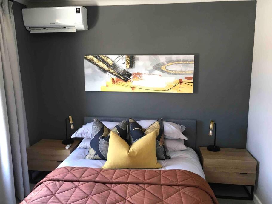 Suitetrails - Cheerful 2 bedroomed townhouse with patio