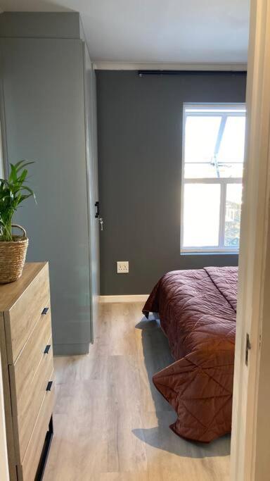 Suitetrails - Cheerful 2 bedroomed townhouse with patio