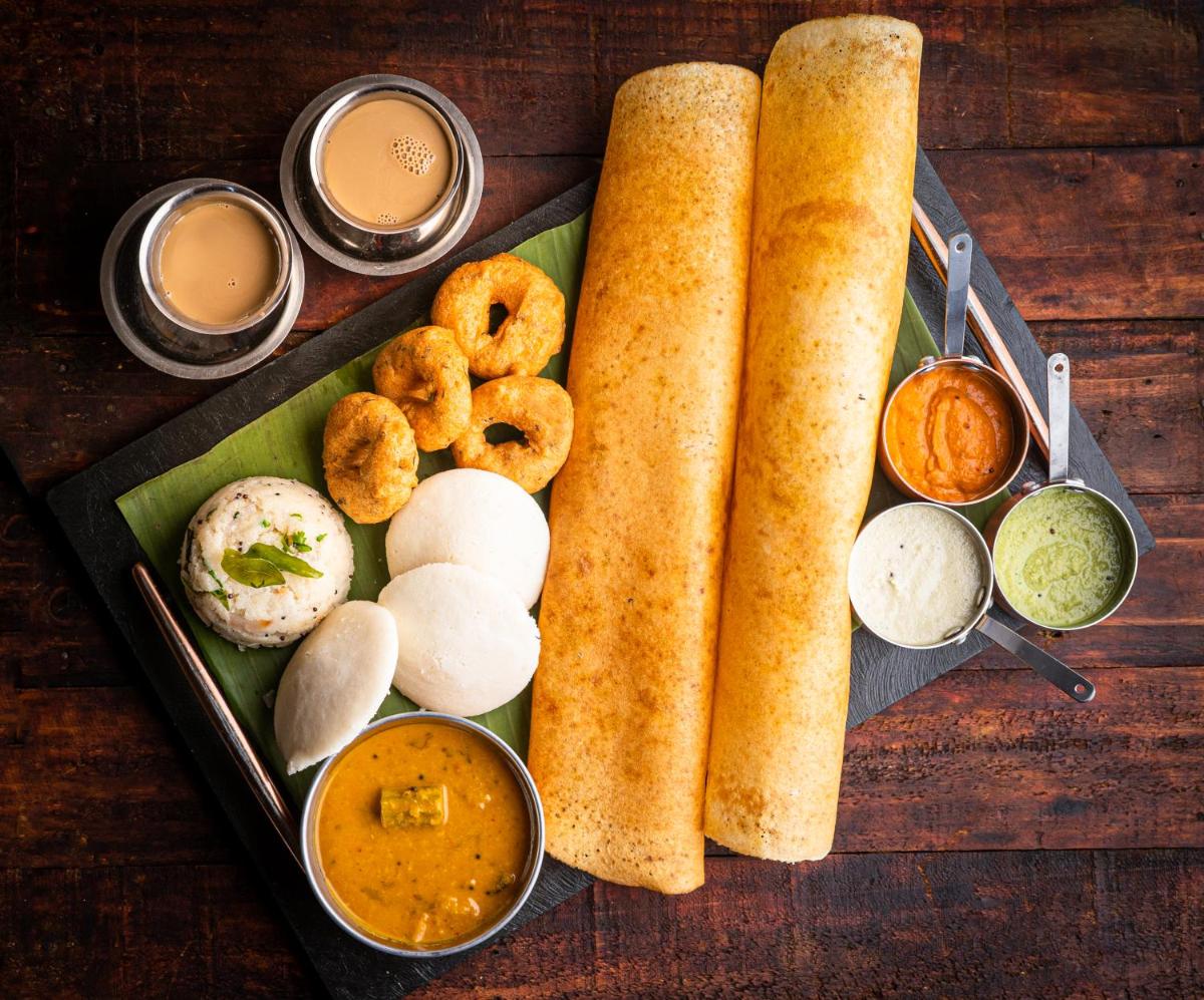 a tray of food with various types of food at Hyatt Regency Dehradun Resort and Spa in Dehradun