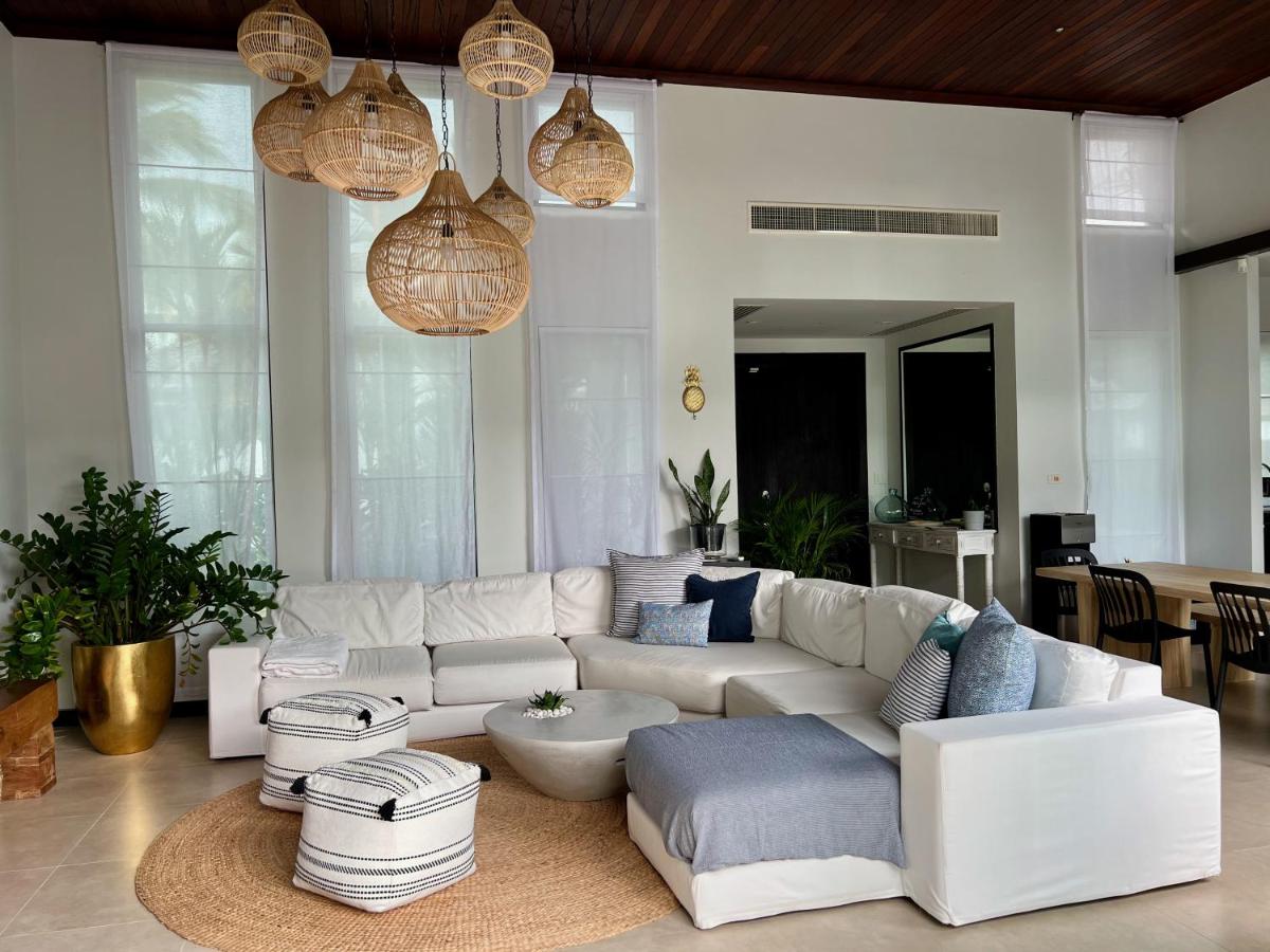 Discover a Tropical Hideaway within walking distance to Bang Tao Beach - Housity