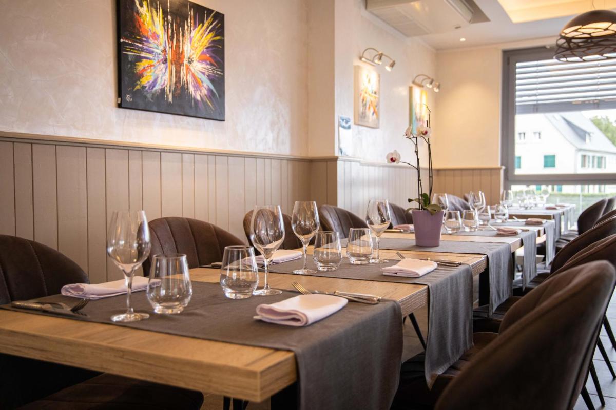 Restaurant ou autre lieu de restauration dans l'établissement Hôtel Restaurant et Spa Au Tilleul