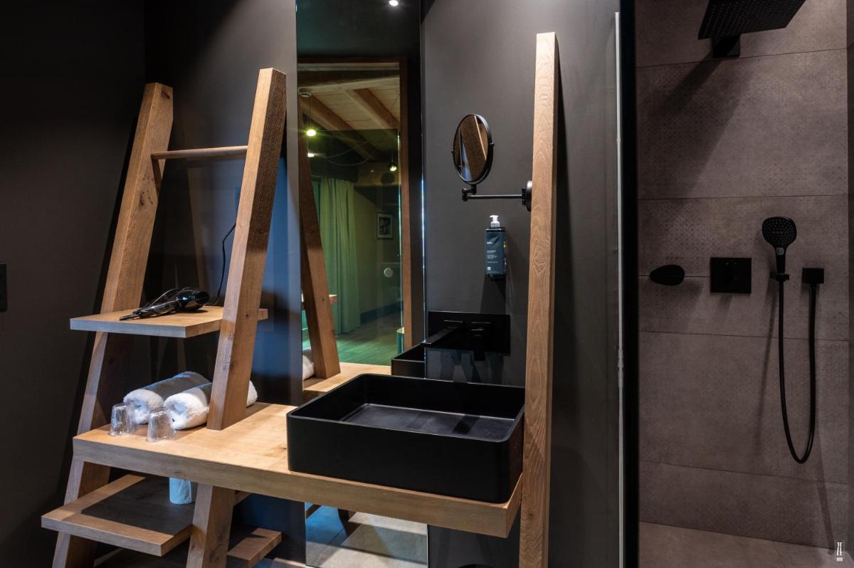 Salle de bains dans l'établissement Chalet Hôtel & Spa Le Collet