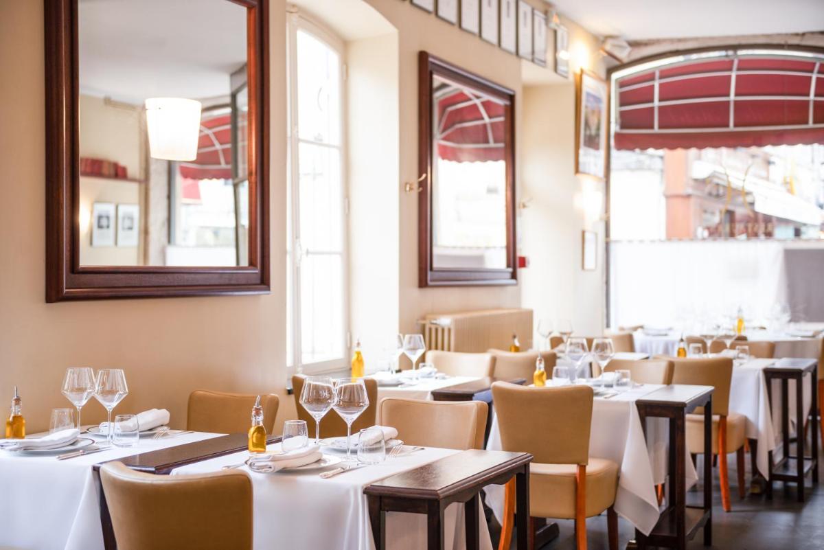 Restaurant ou autre lieu de restauration dans l'établissement L'Hôtel