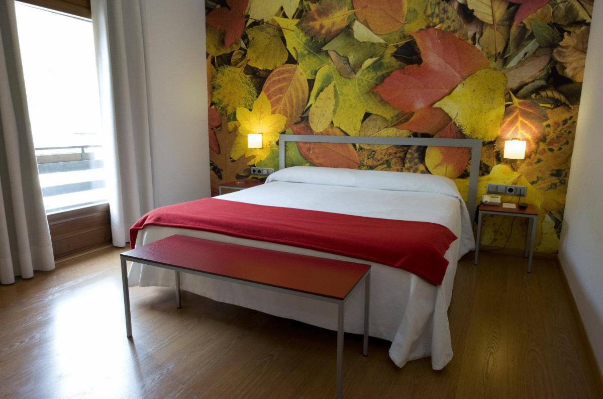 Cama o camas de una habitación en Hotel Restaurant Pessets & SPA