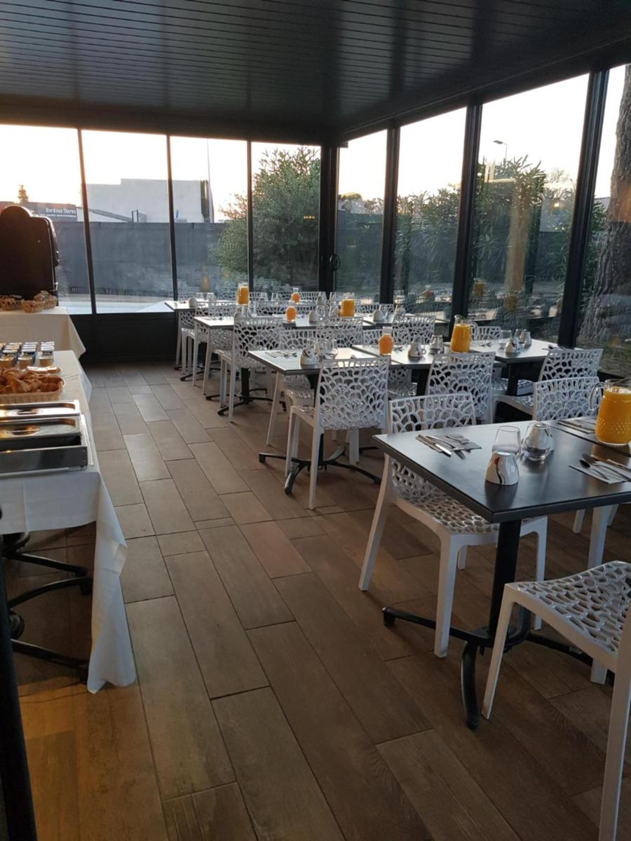 Restaurant ou autre lieu de restauration dans l'établissement Kyriad Carcassonne - Aéroport