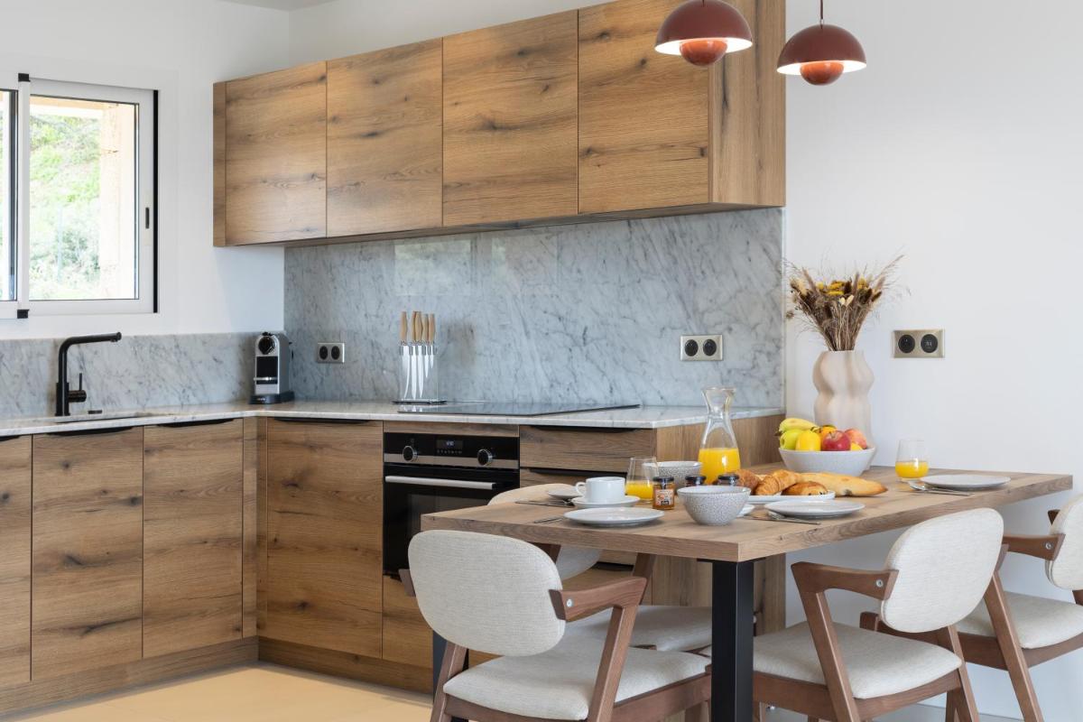 Cuisine ou kitchenette dans l'établissement Résidence Omigna