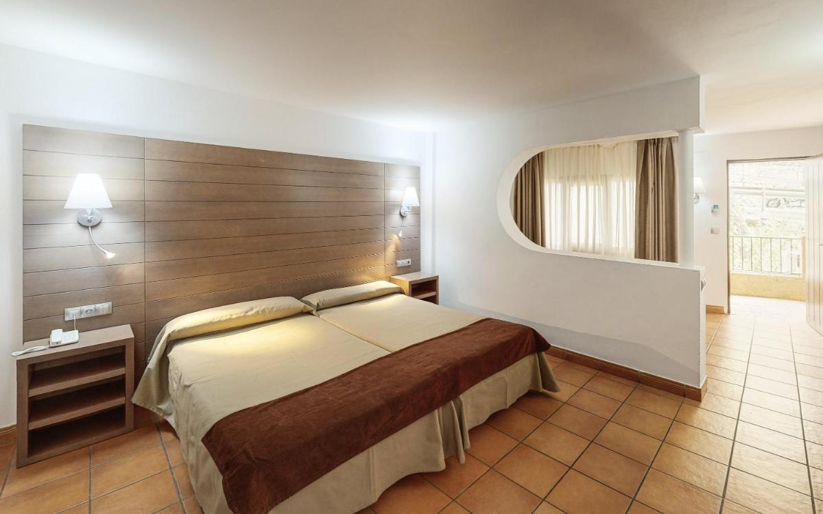 Cama o camas de una habitación en Hotel Sierra de Cazorla & SPA 3*
