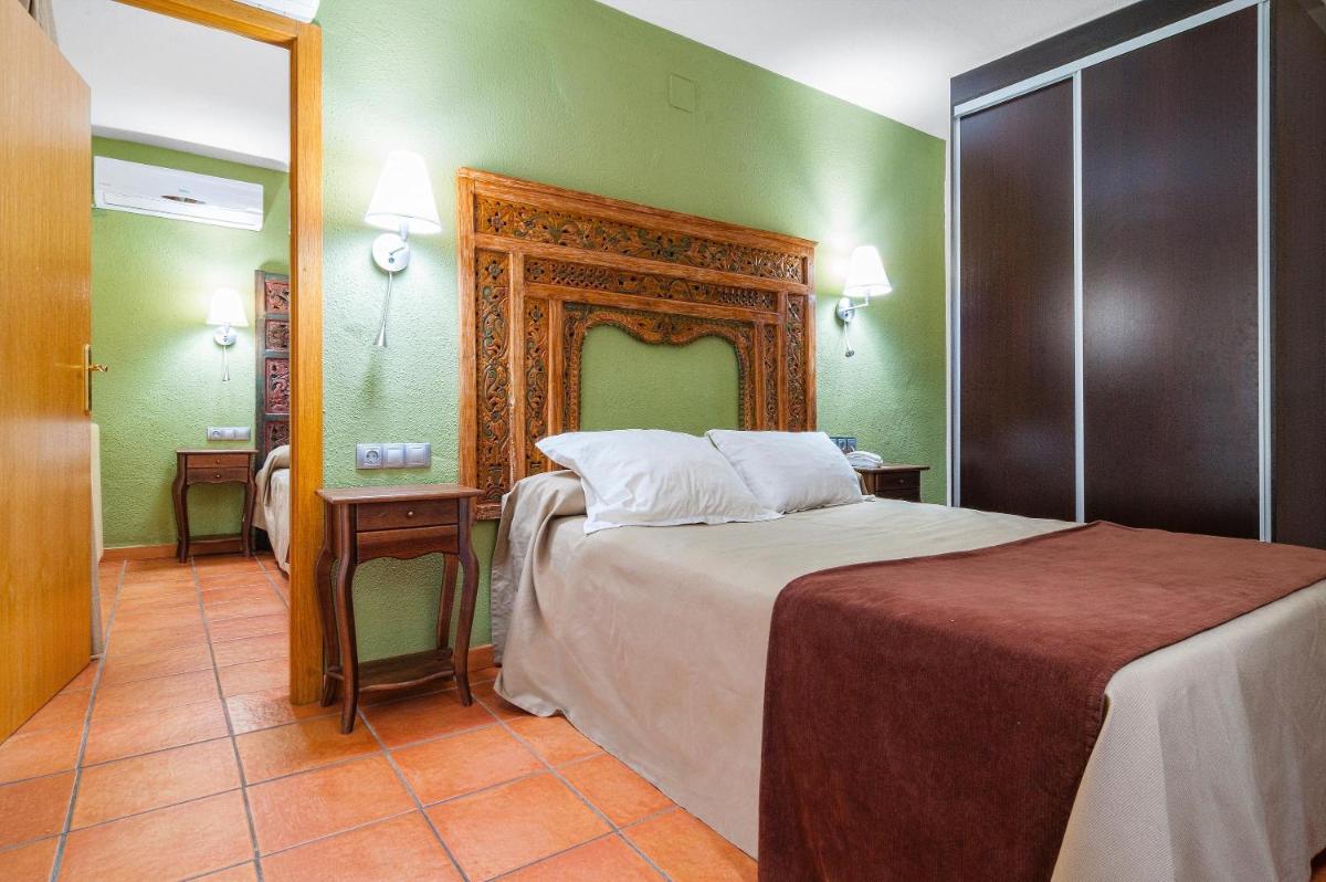 Cama o camas de una habitación en Hotel Sierra de Cazorla & SPA 3*