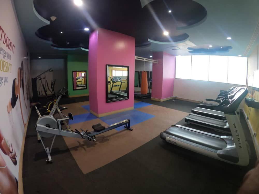 A lovely studio apartment with gym and pool access - Housity