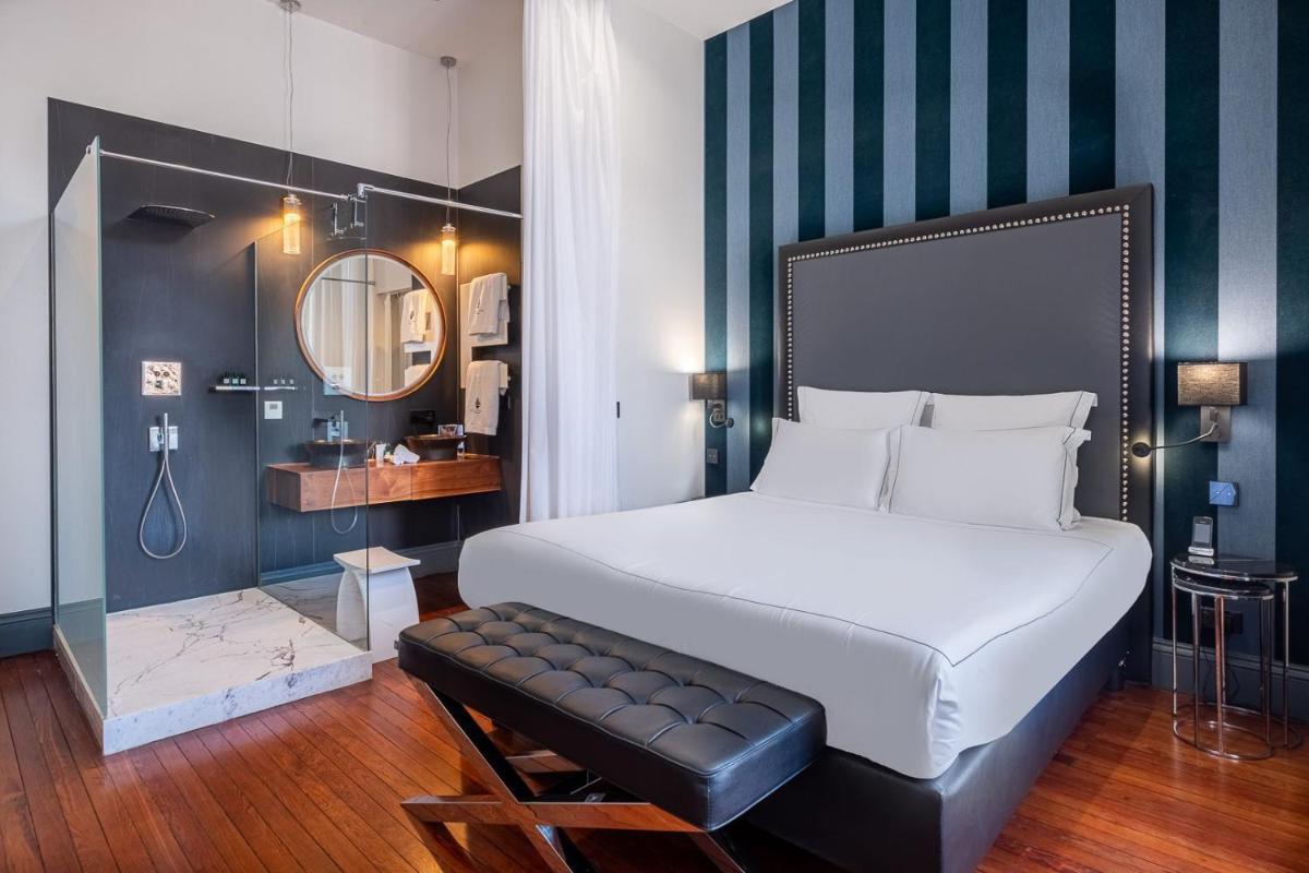 Un ou plusieurs lits dans un hébergement de l'établissement Le Palais Gallien Hôtel & Spa