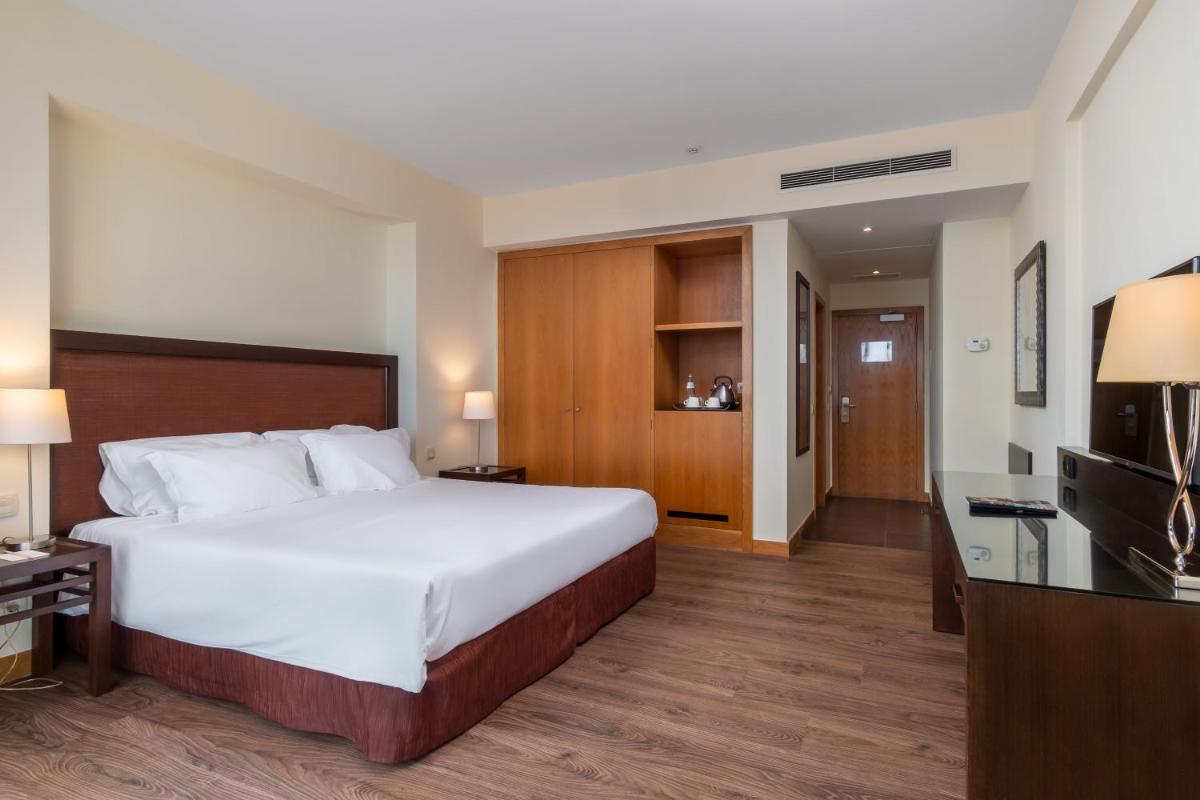 Uma cama ou camas num quarto em TUI Blue Gardens - Adults-only - Savoy Signature