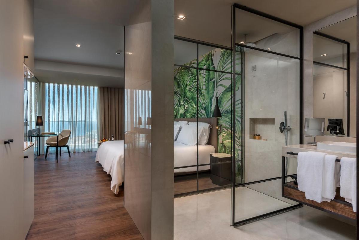 Uma cama ou camas num quarto em TUI Blue Gardens - Adults-only - Savoy Signature