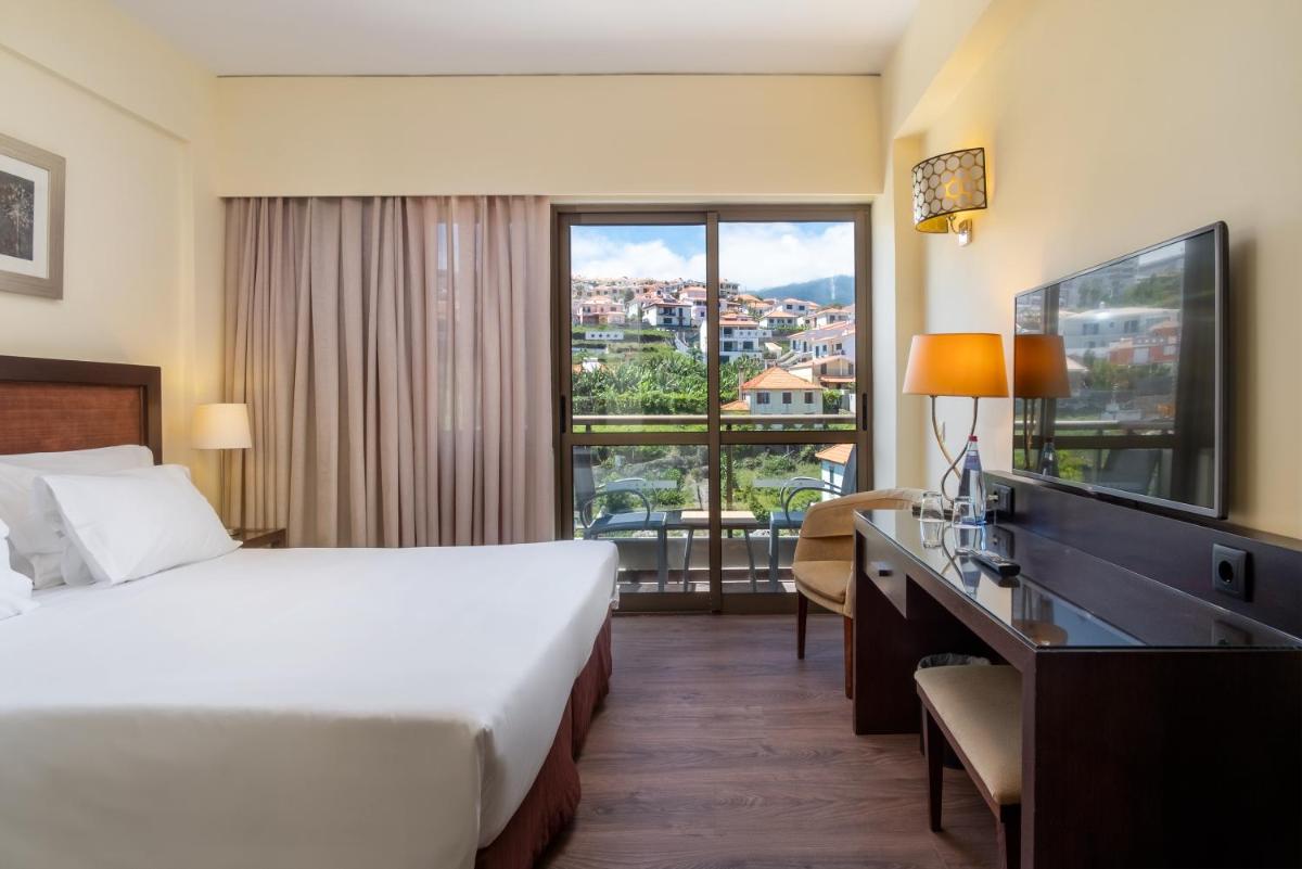 Uma cama ou camas num quarto em TUI Blue Gardens - Adults-only - Savoy Signature