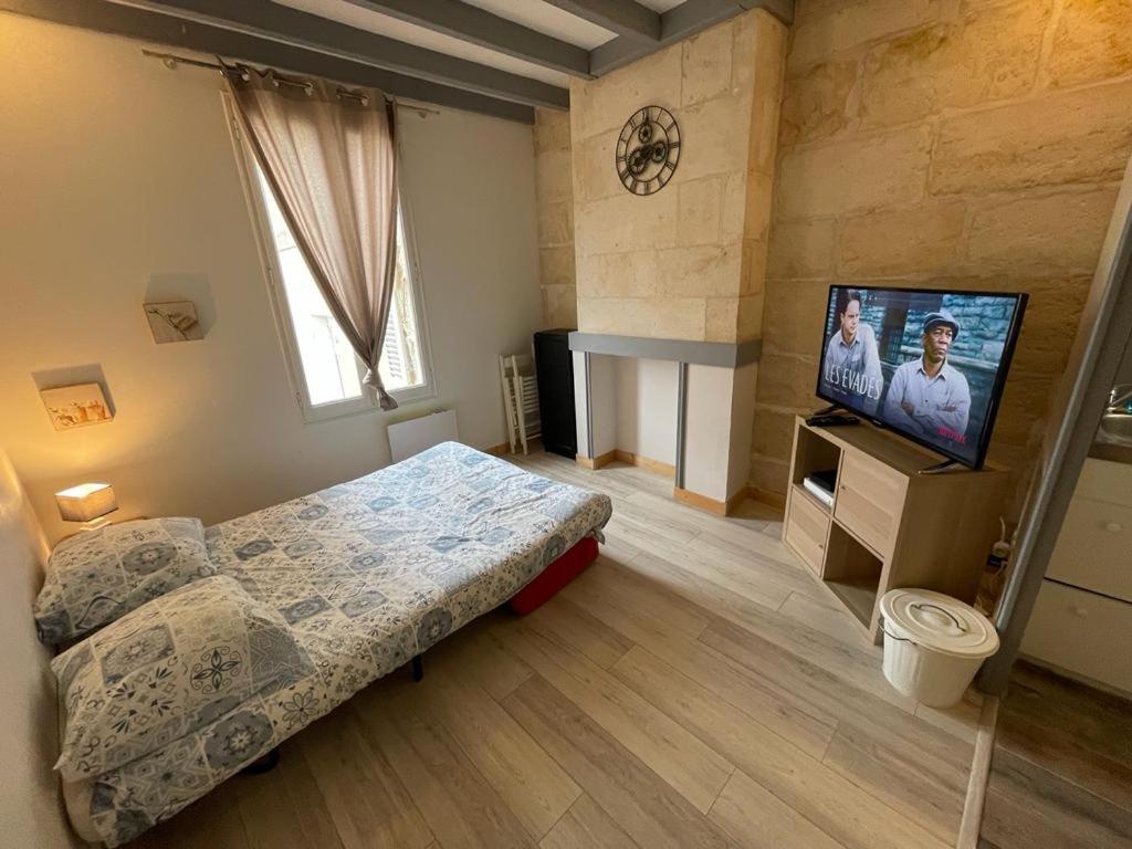 Le cosy- calme, idéale couple, business, longs séjours( WIFI, Netflix, stationnement public gratuit) - Housity