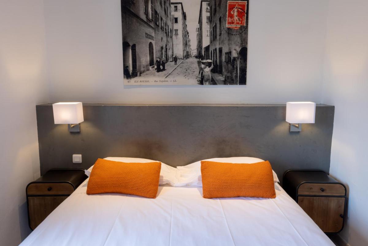 Un ou plusieurs lits dans un hébergement de l'établissement Hôtel Casa Rossa & Spa