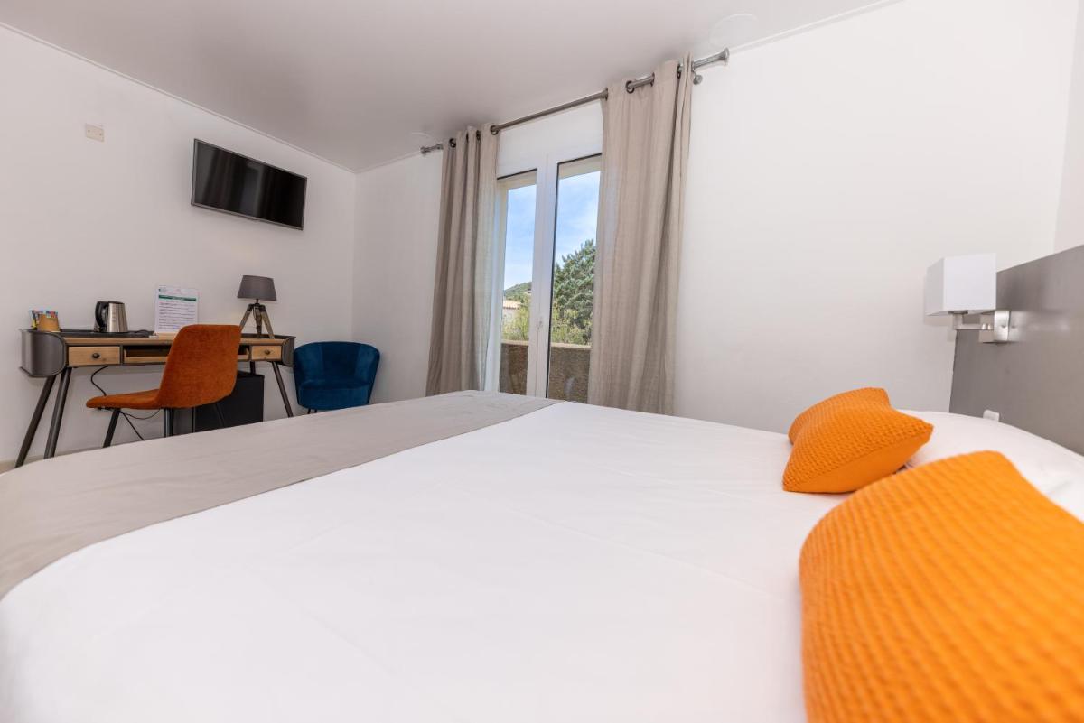 Un ou plusieurs lits dans un hébergement de l'établissement Hôtel Casa Rossa & Spa