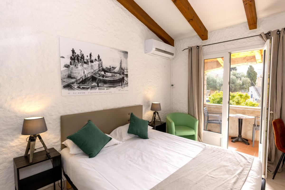Un ou plusieurs lits dans un hébergement de l'établissement Hôtel Casa Rossa & Spa