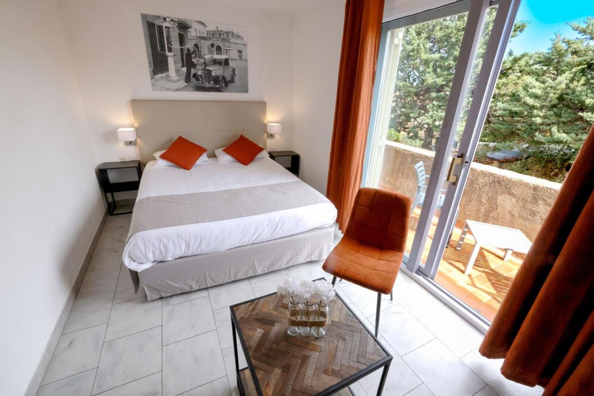Un ou plusieurs lits dans un hébergement de l'établissement Hôtel Casa Rossa & Spa