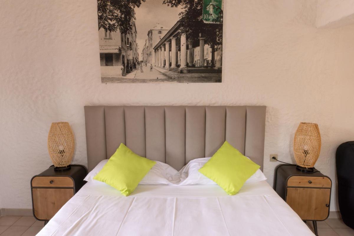 Un ou plusieurs lits dans un hébergement de l'établissement Hôtel Casa Rossa & Spa