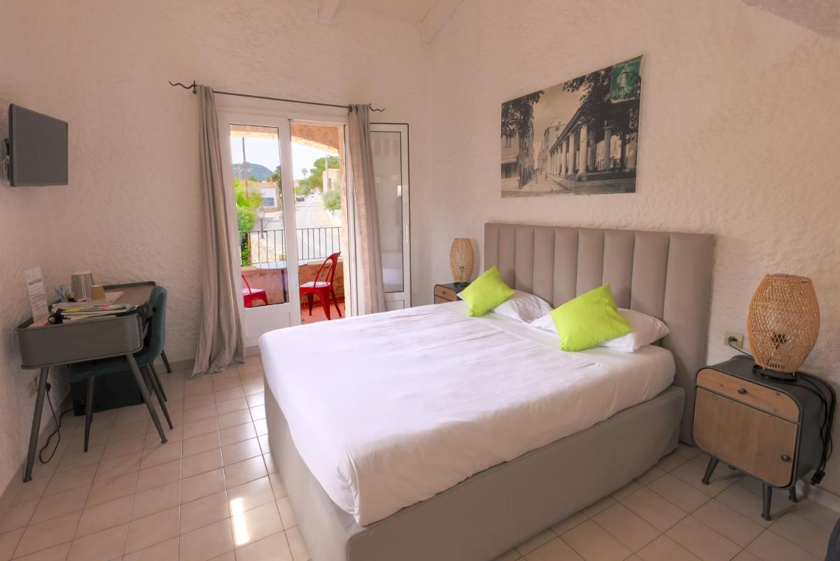Un ou plusieurs lits dans un hébergement de l'établissement Hôtel Casa Rossa & Spa