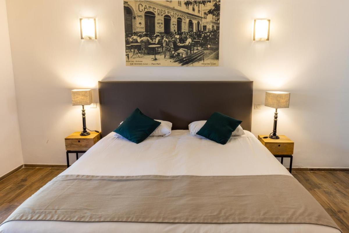 Un ou plusieurs lits dans un hébergement de l'établissement Hôtel Casa Rossa & Spa