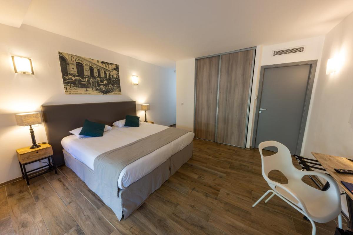 Un ou plusieurs lits dans un hébergement de l'établissement Hôtel Casa Rossa & Spa