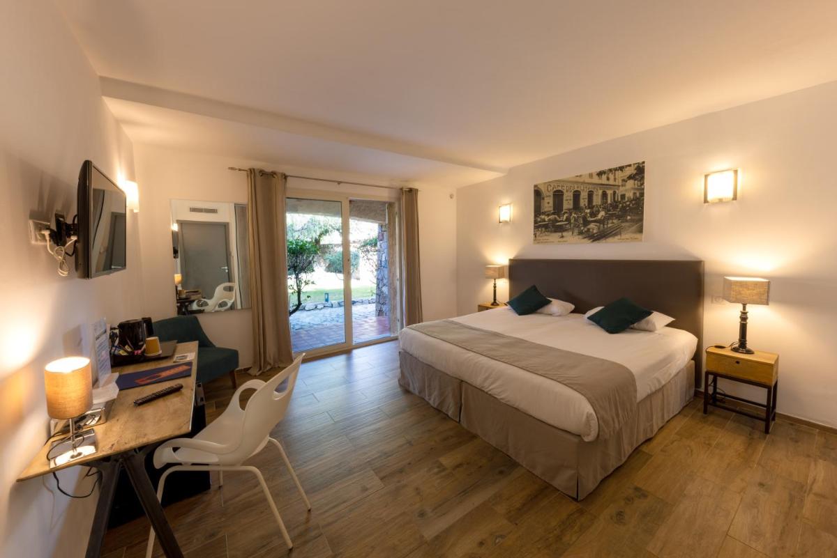 Un ou plusieurs lits dans un hébergement de l'établissement Hôtel Casa Rossa & Spa