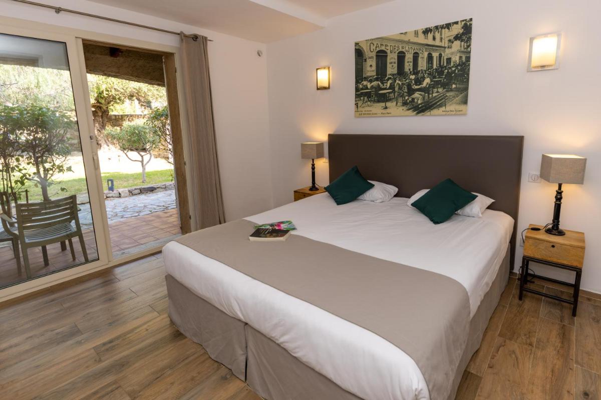 Un ou plusieurs lits dans un hébergement de l'établissement Hôtel Casa Rossa & Spa