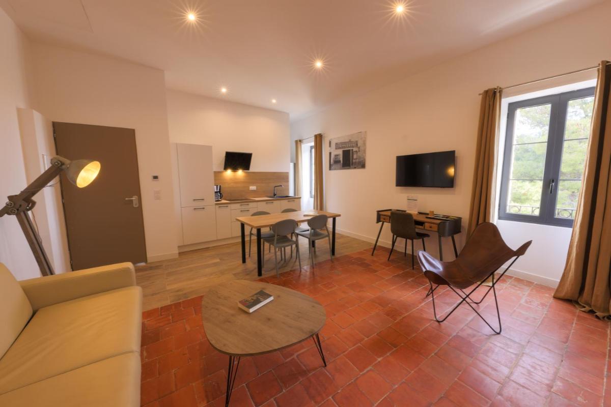 Télévision ou salle de divertissement dans l'établissement Hôtel Casa Rossa & Spa