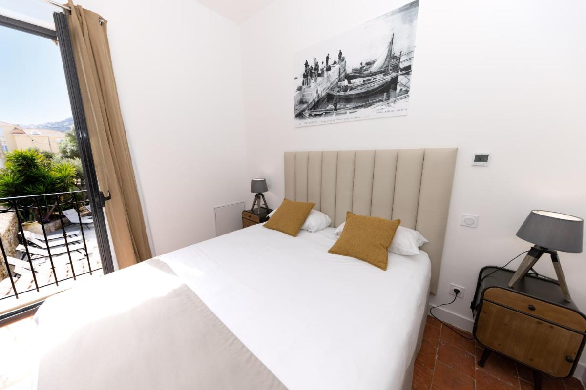 Un ou plusieurs lits dans un hébergement de l'établissement Hôtel Casa Rossa & Spa