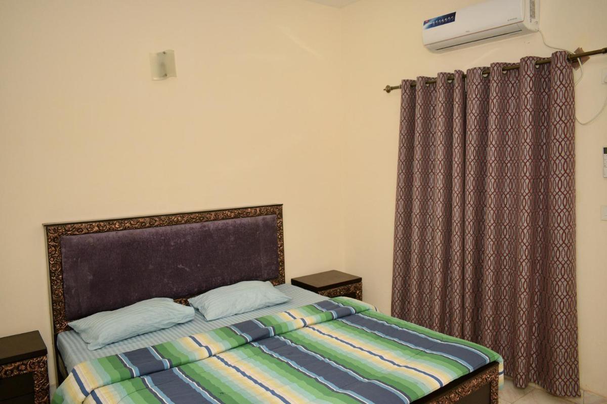 Suitetrails - Lovely 2-bedroom apartment in Bahria Town