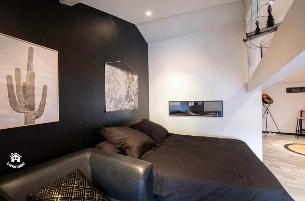 Le Caractère - centre ville- WIFI- parking - Housity
