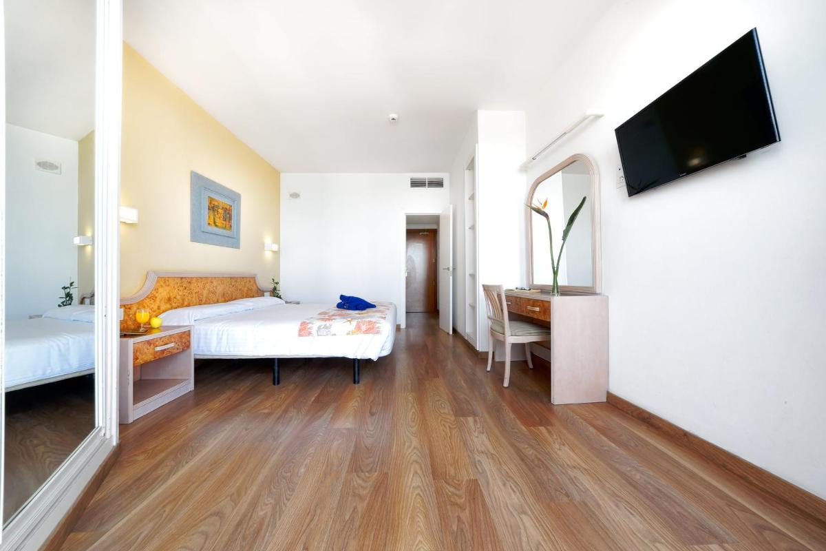 Cama o camas de una habitación en Relaxia Beverly Park