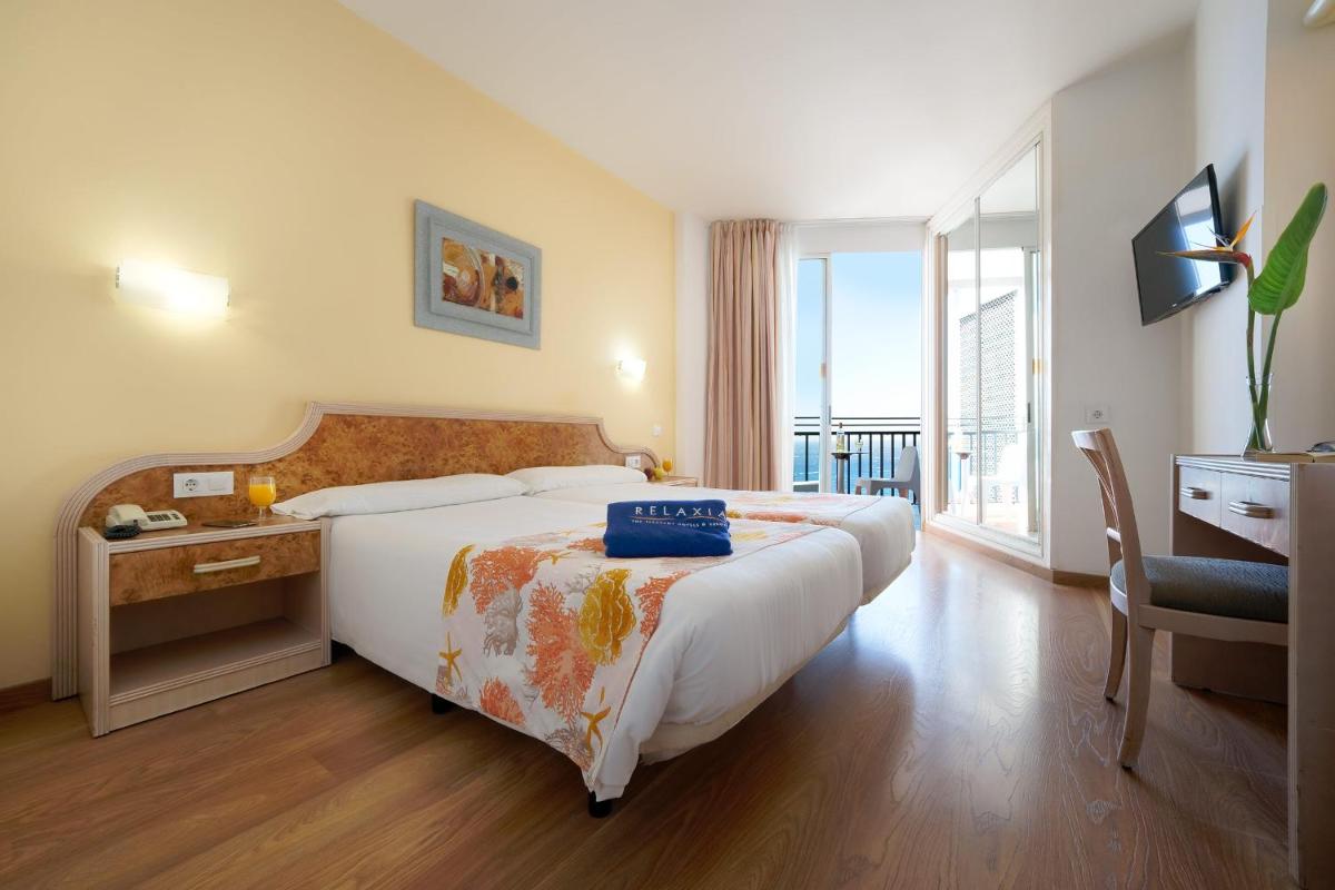 Cama o camas de una habitación en Relaxia Beverly Park