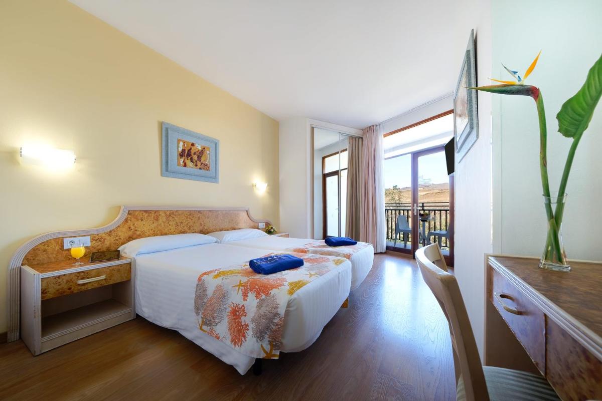 Cama o camas de una habitación en Relaxia Beverly Park
