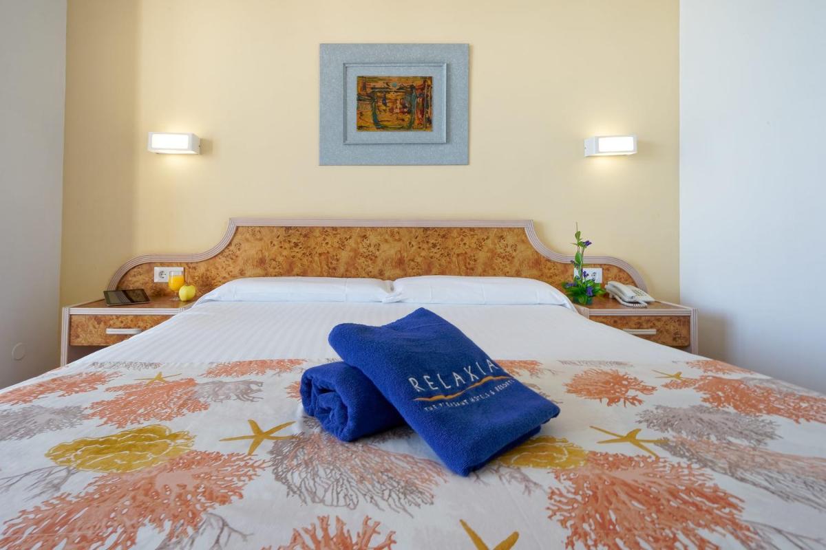 Cama o camas de una habitación en Relaxia Beverly Park