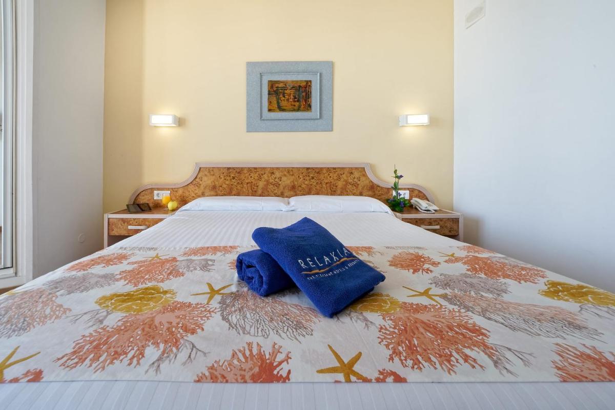 Cama o camas de una habitación en Relaxia Beverly Park