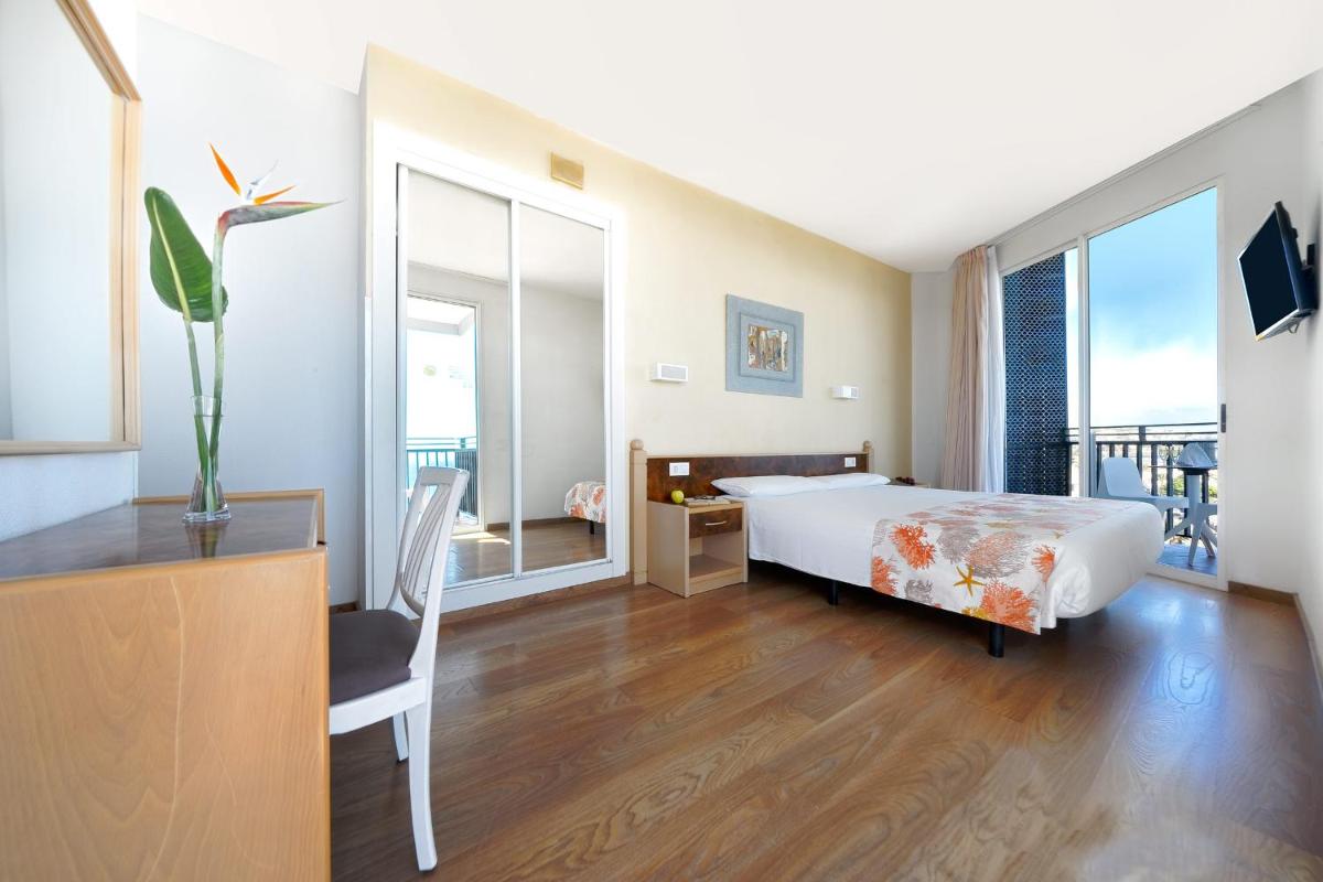 Cama o camas de una habitación en Relaxia Beverly Park